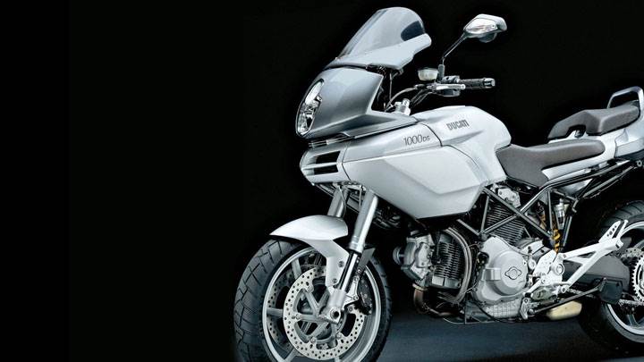 Ducati Multistrada 1000 DS 2005 Side Pose And Black Background